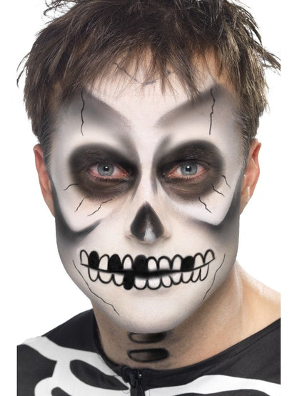 Skeleton Make Up Set includes 2 colour face paint palette, black crayon, sponge