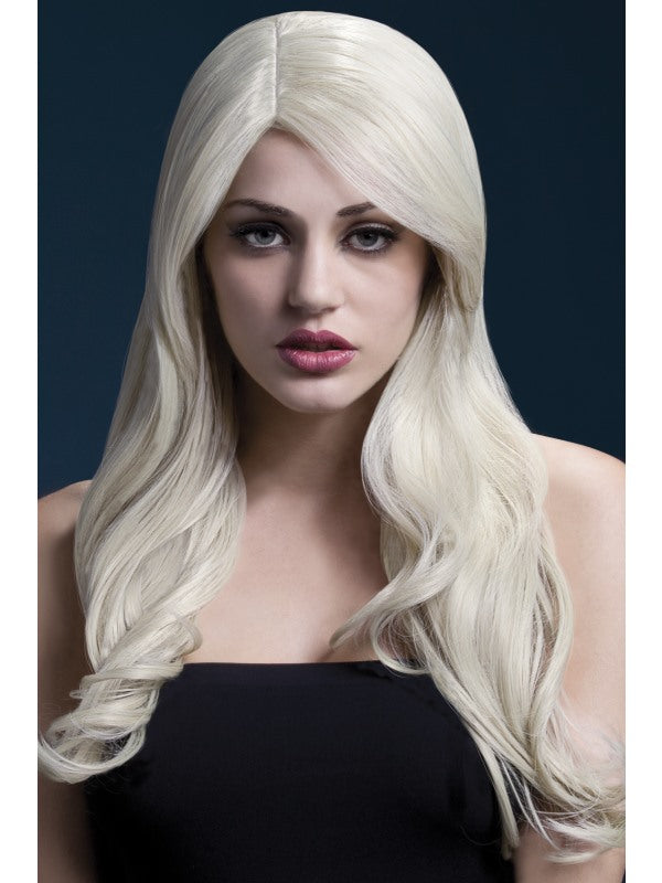 Fever Nicole Professional Quality Synthetic Wig. Blonde. Long, wavy with professional wig cap. Styleable and heat resistant to 120C/248F.