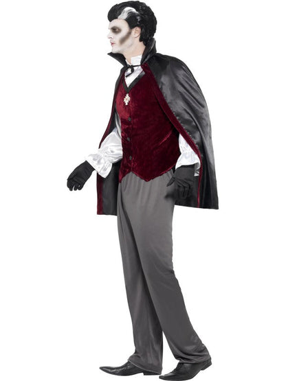 Mens Halloween Vampire Costume includes trousers, shirt with mock waistcoat, cape with medal and gloves