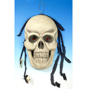 Giant 3D Hanging Skull Plaque with Flax Hair and Light Up Eyes. Skull dimensions 80cm high * 50cm wide.