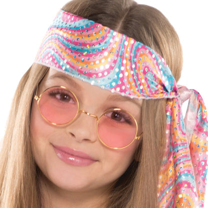 Disco Diva Teen Costume includes a shimmery, swirl-printed mini dress with long bell sleeves and a blue ribbon closure forming a cute keyhole neckline. Tie on the matching headscarf for a far out look everyone will dig!