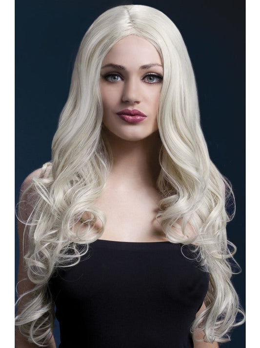 Fever Rhianne Professional Quality Synthetic Wig. Blonde. Long, curly with skin parting and professional wig cap. Styleable and heat resistant to 120C/248F.